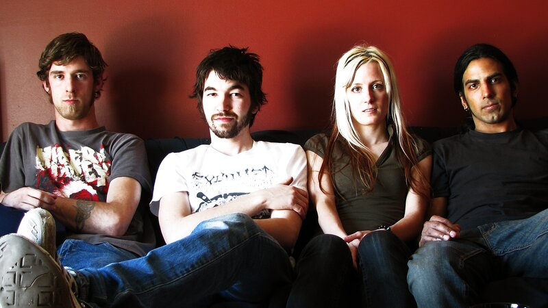 Four People on a Couch — Red