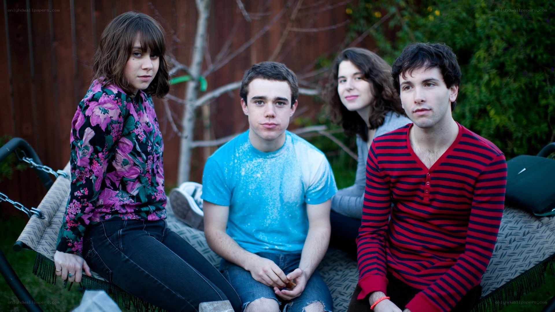 four people on a hammock