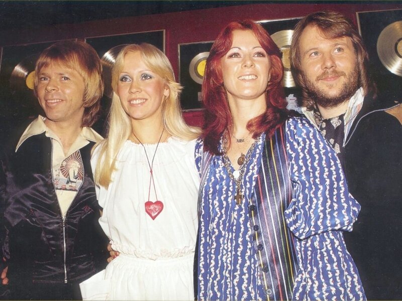 Four People Posing — Blue, Happy