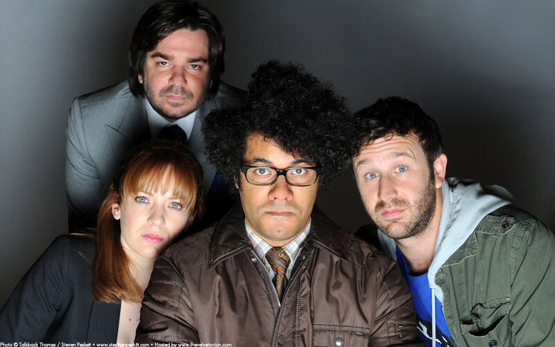 four people posing for a photo