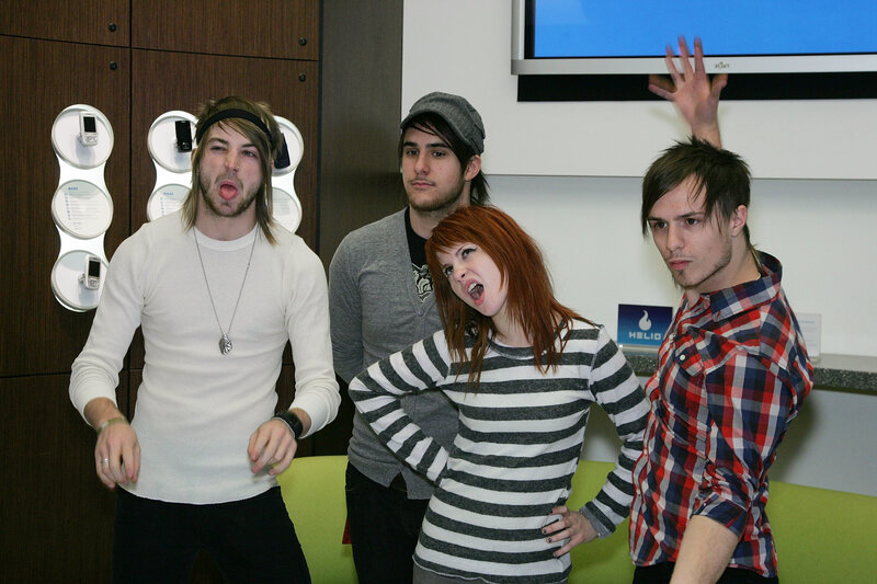 four people posing playfully