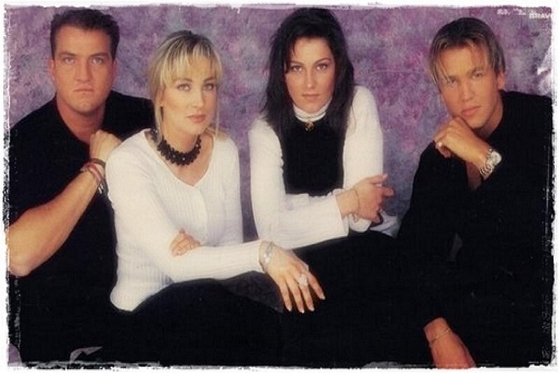 Four People Posing — Purple