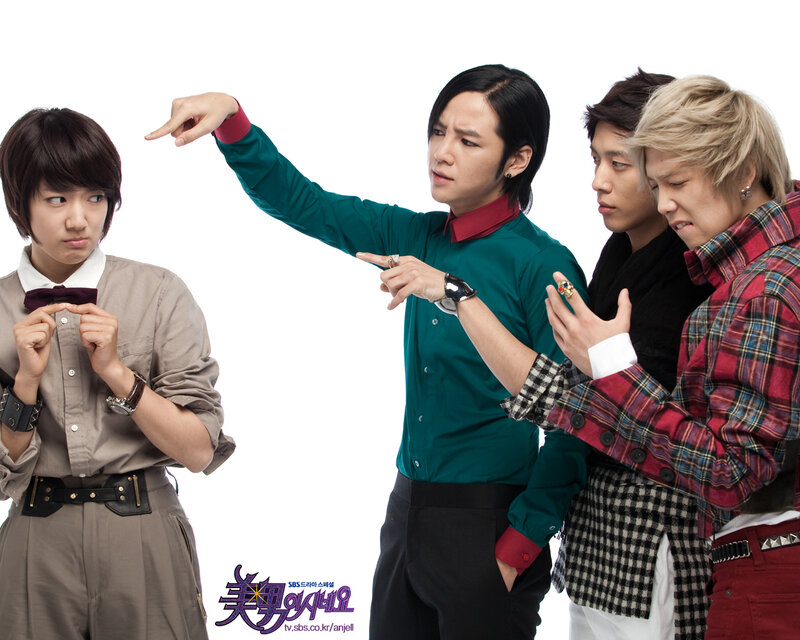 four people posing together