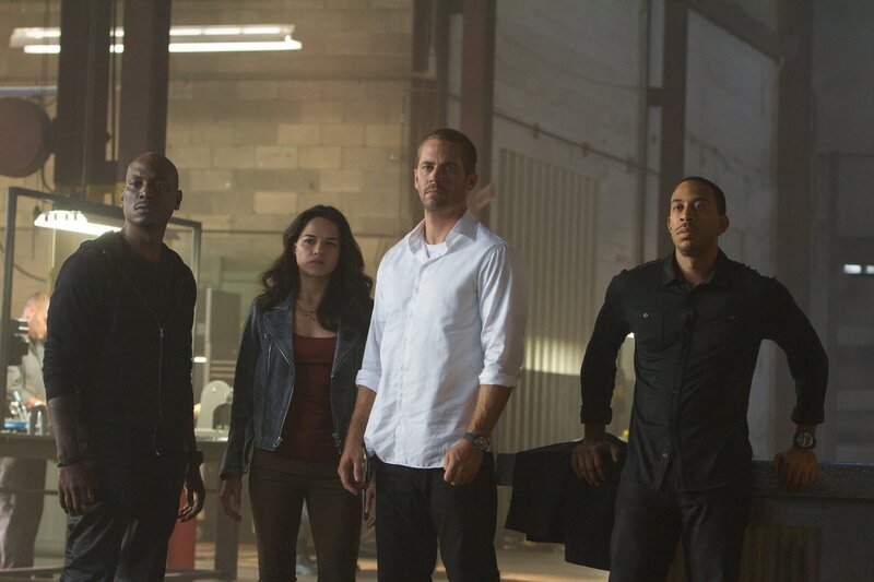 Four People Standing — Black, Serious