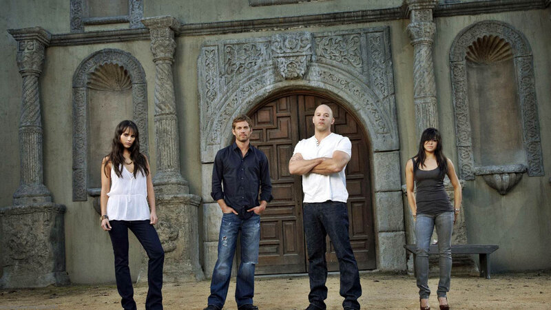 Four People Standing — Gray
