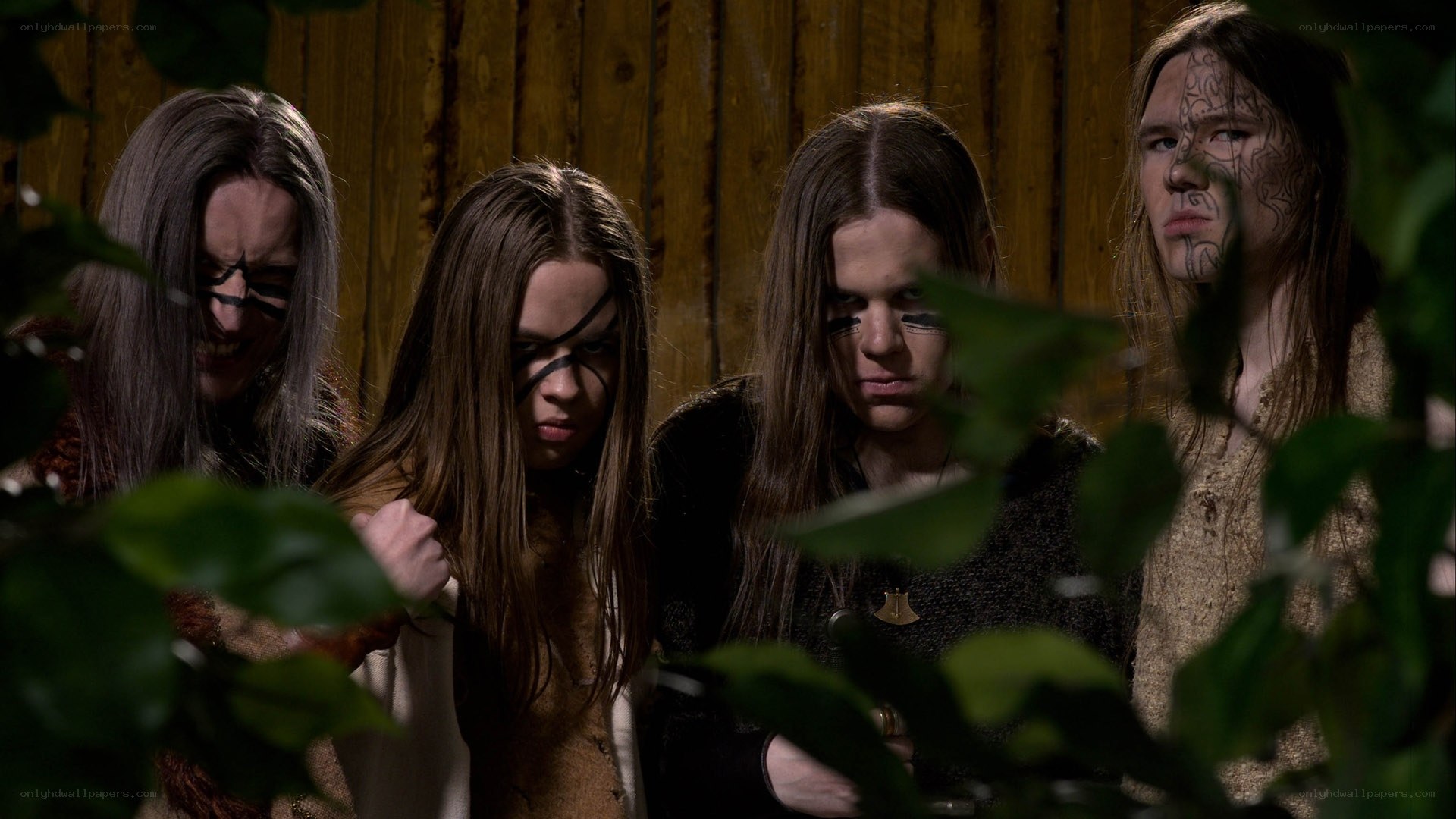 four people with face paint