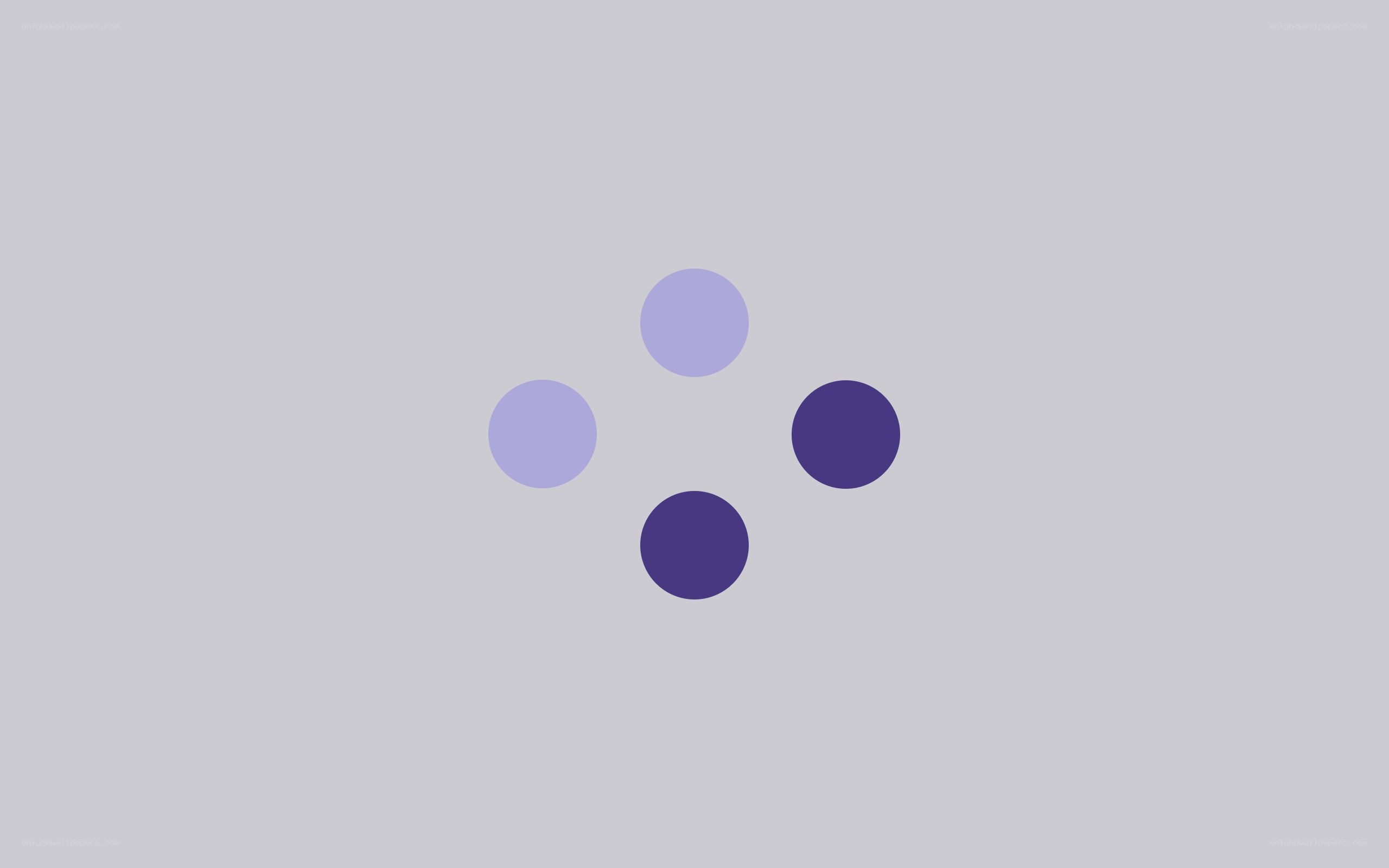 four purple circles on gray