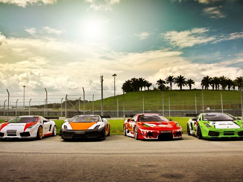 Four Race Cars on Track