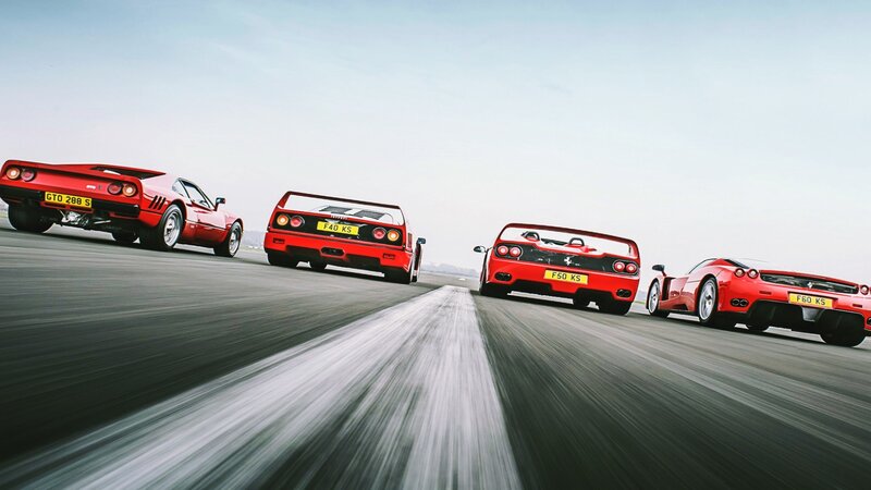 Four Red Ferrari Cars