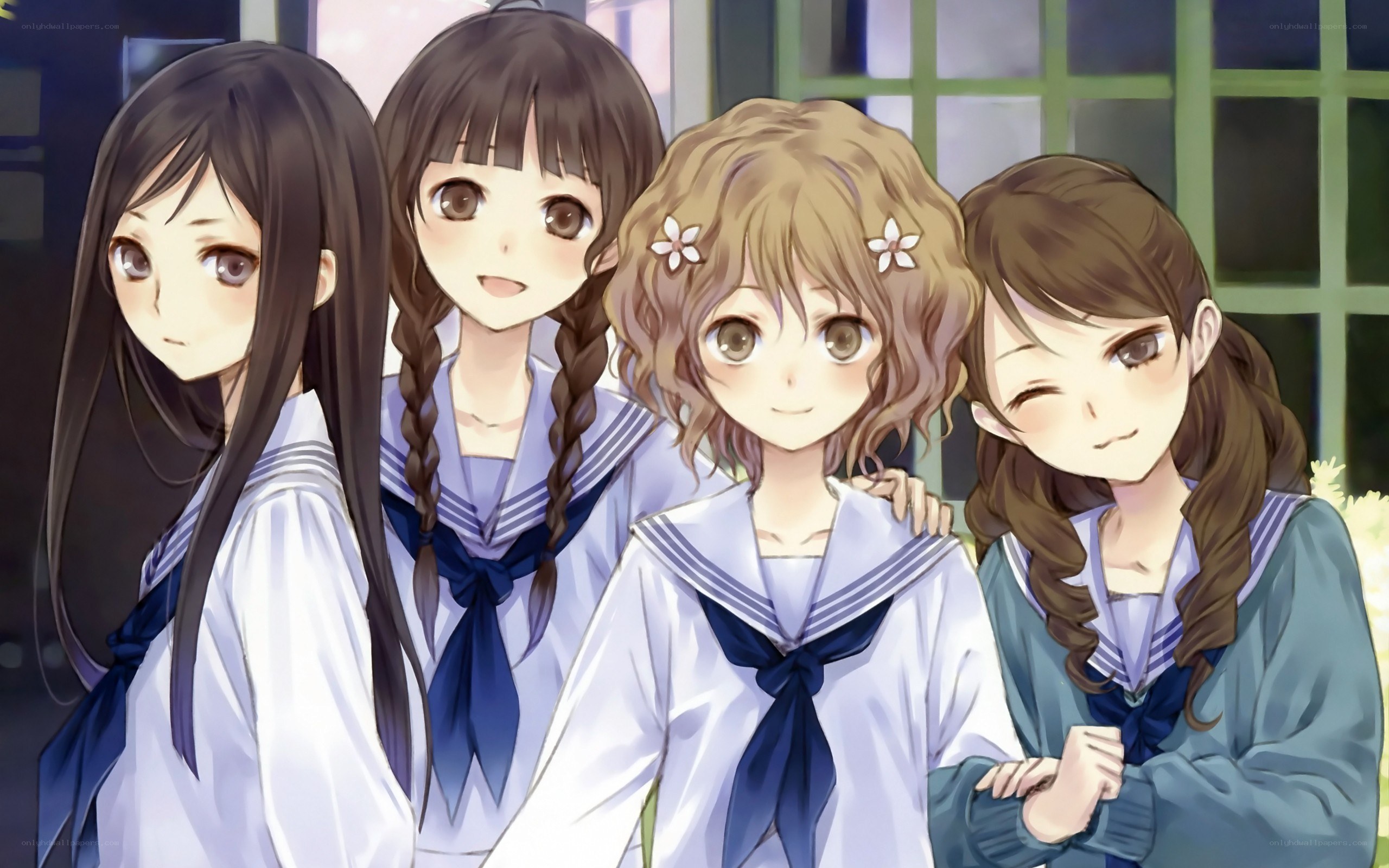 four schoolgirls in uniforms