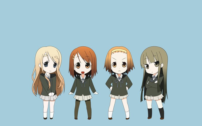 four schoolgirls in uniforms