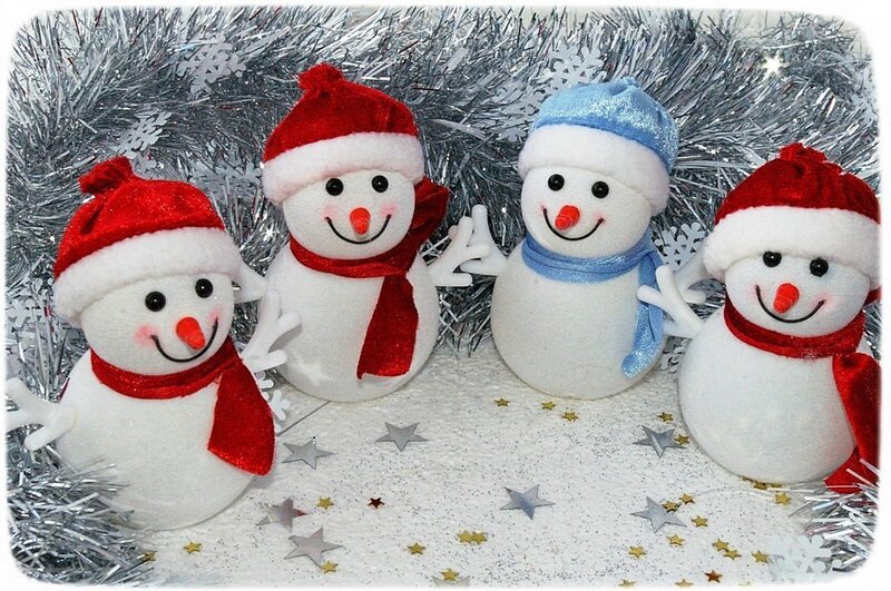 Four Snowmen Figurines