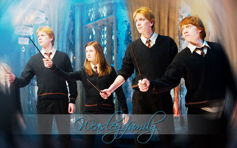 Four Students Holding Wands