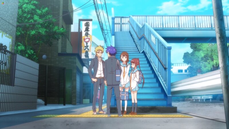 Four Students on Sidewalk
