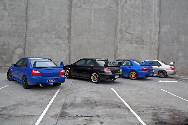 Four Subaru Cars — Blue
