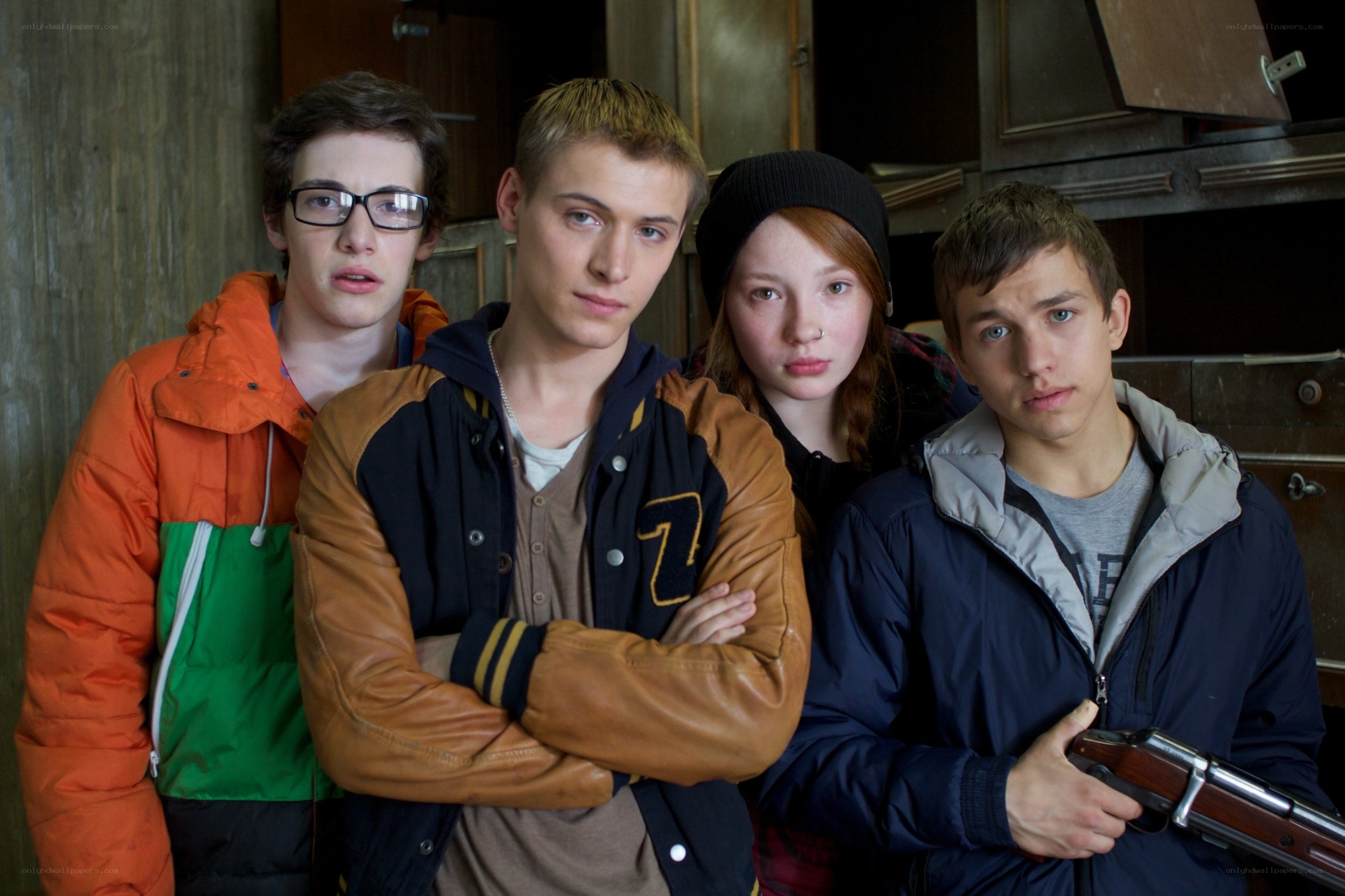 Four teens in a tense scene
