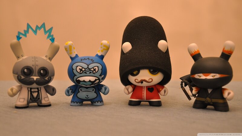 Four Toy Figurines
