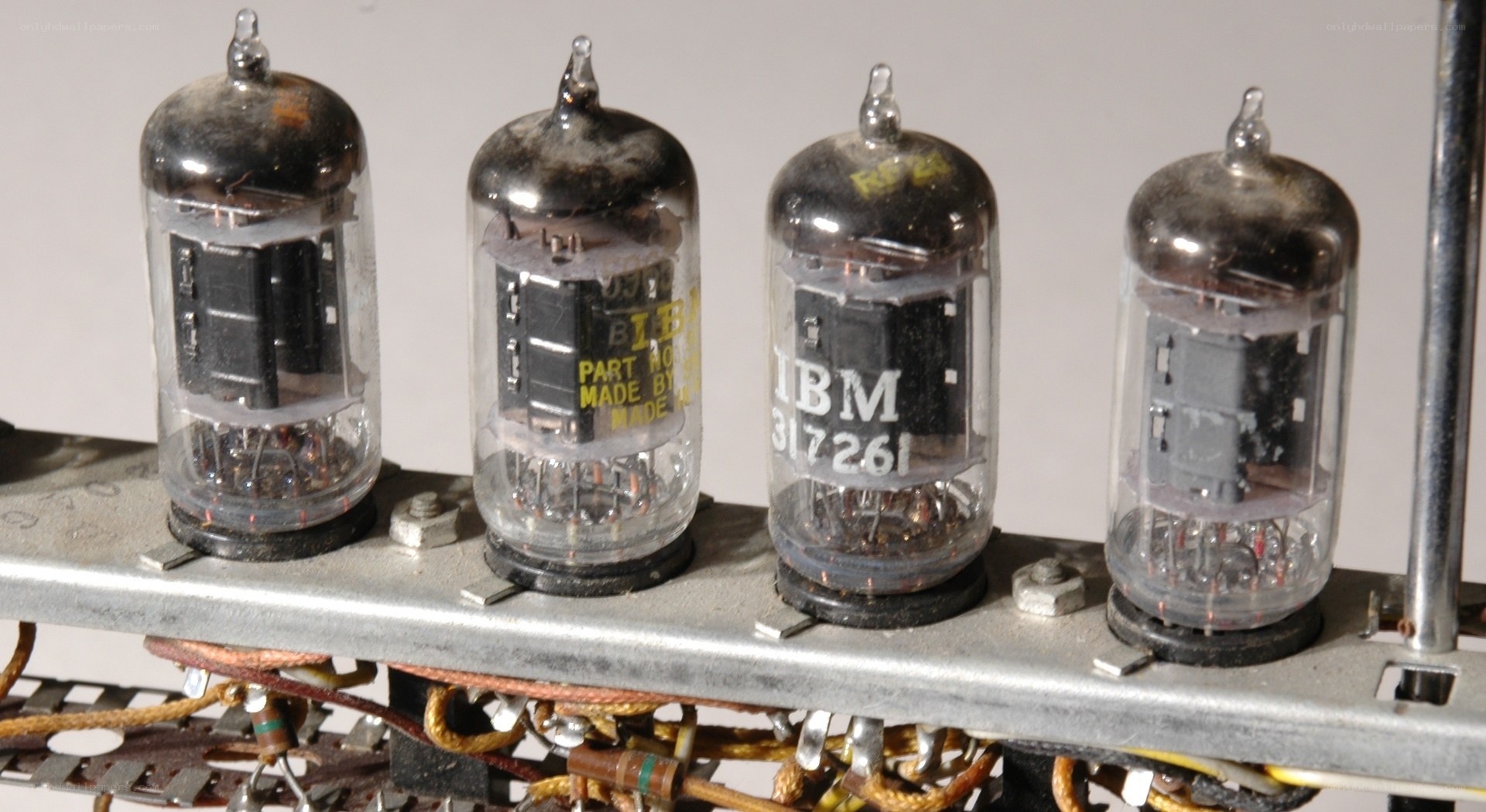 Four vintage IBM vacuum tubes