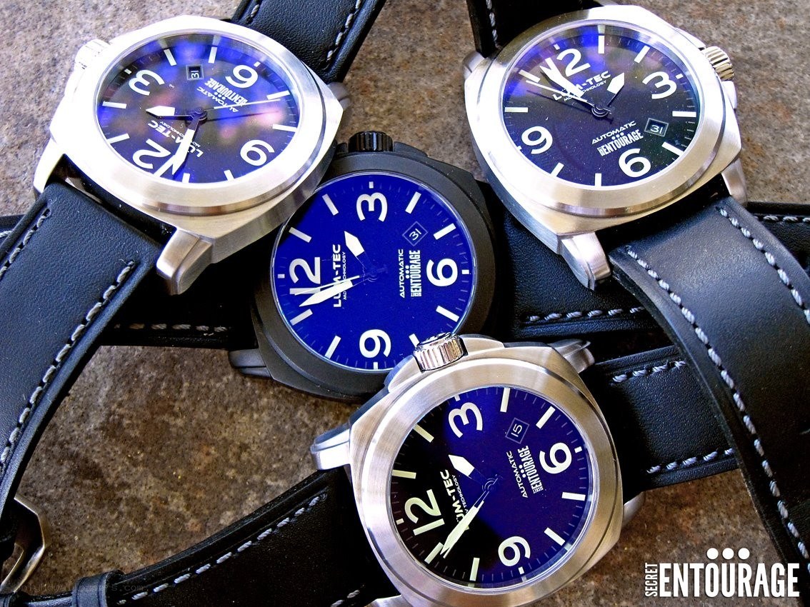 Four watches with blue dials