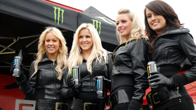 Four Women Holding Cans