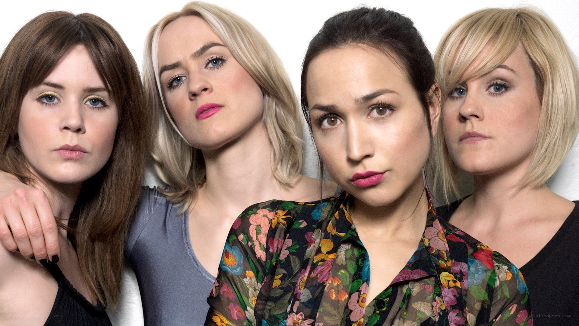 four women in a group portrait