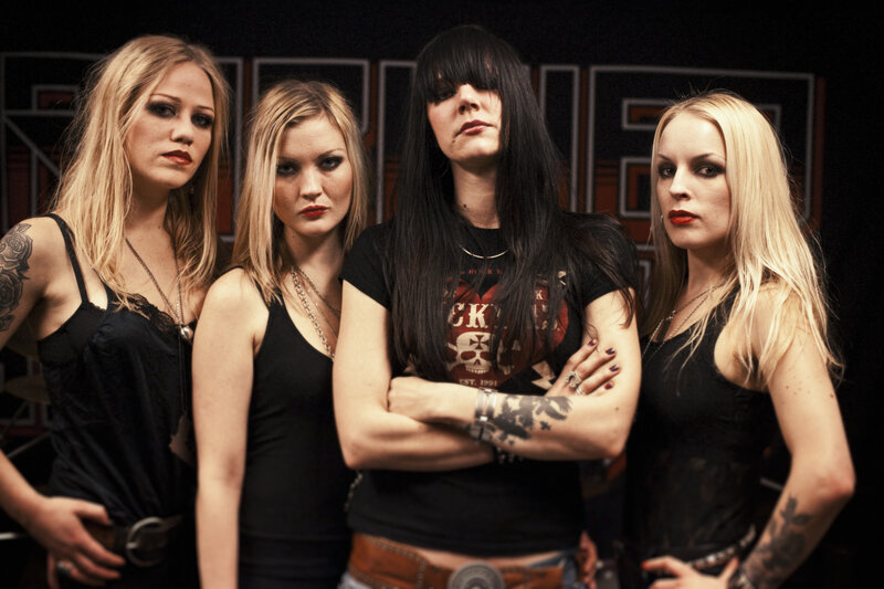 Four Women in Band Attire