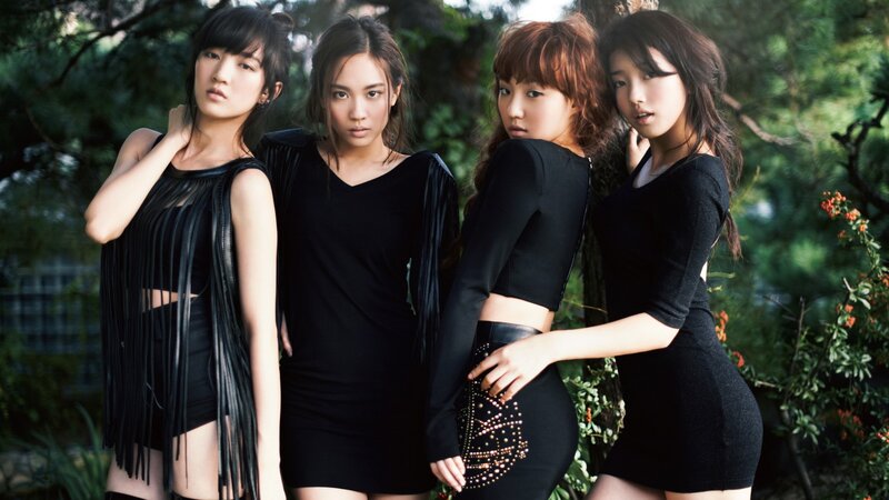 four women in black dresses