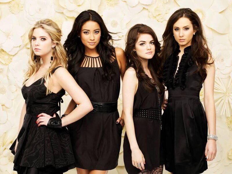 Four Women in Black Dresses — Confident