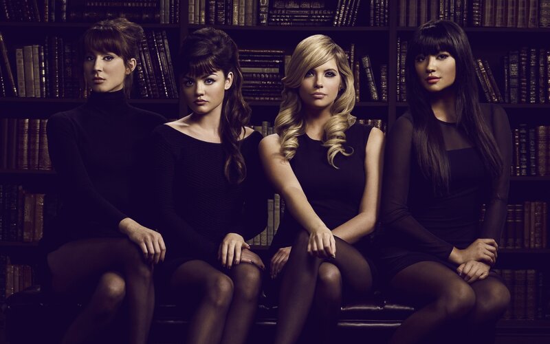 Four Women in Black Dresses — Serious
