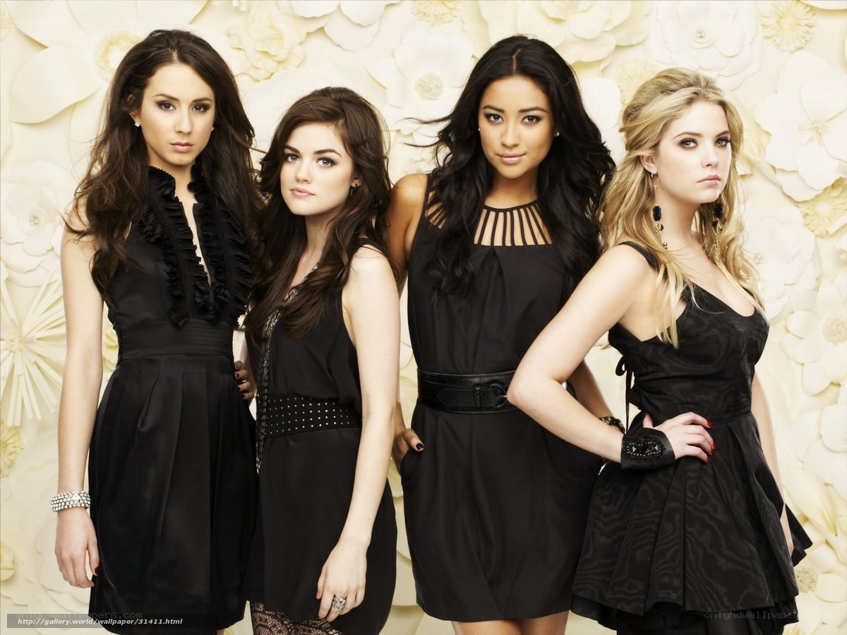 four women in black dresses