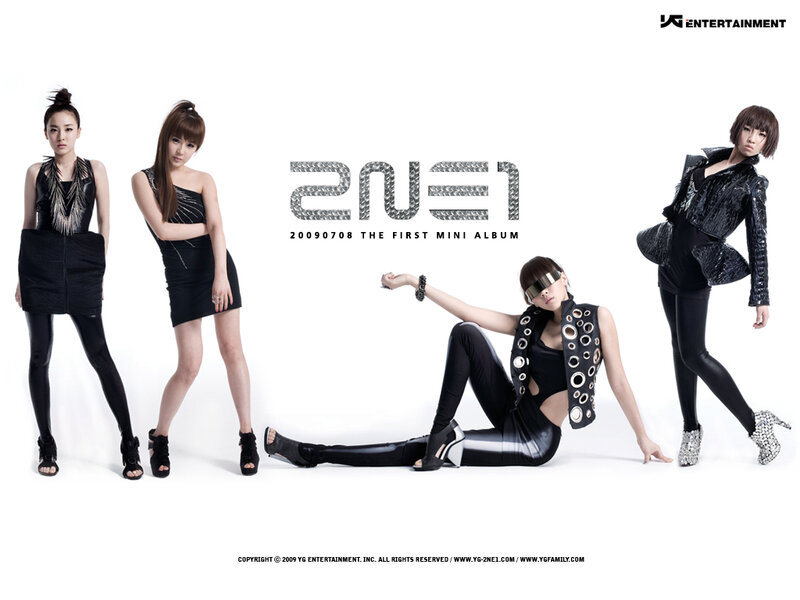 Four Women in Black Outfits — Confident
