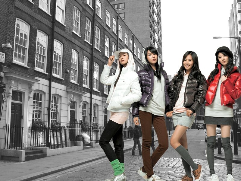 four women in colorful jackets