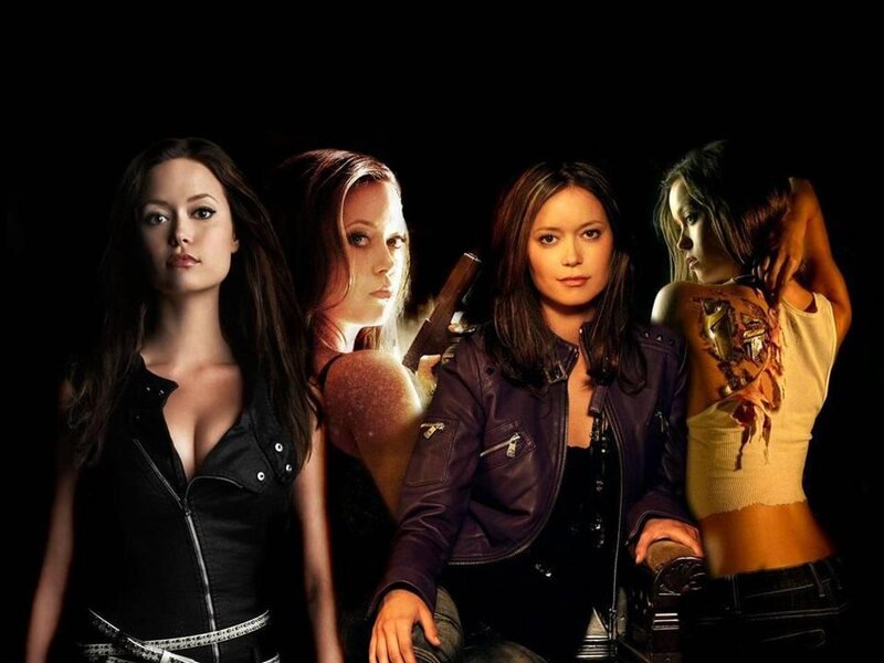 Four Women in Dark Clothing