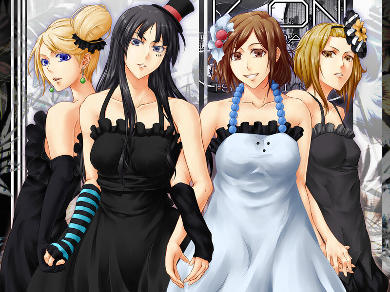 four women in elegant dresses