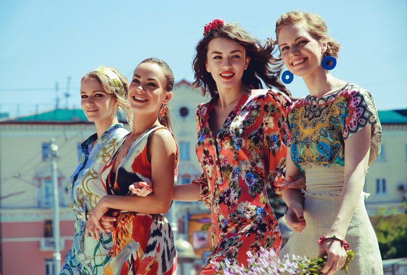 Four Women in Floral Dresses — Red