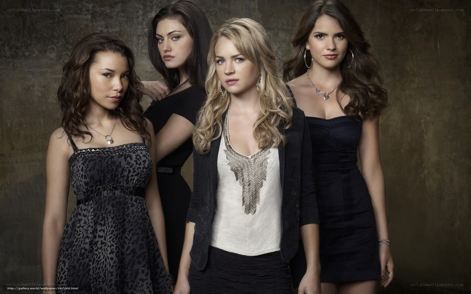 four women in formal wear