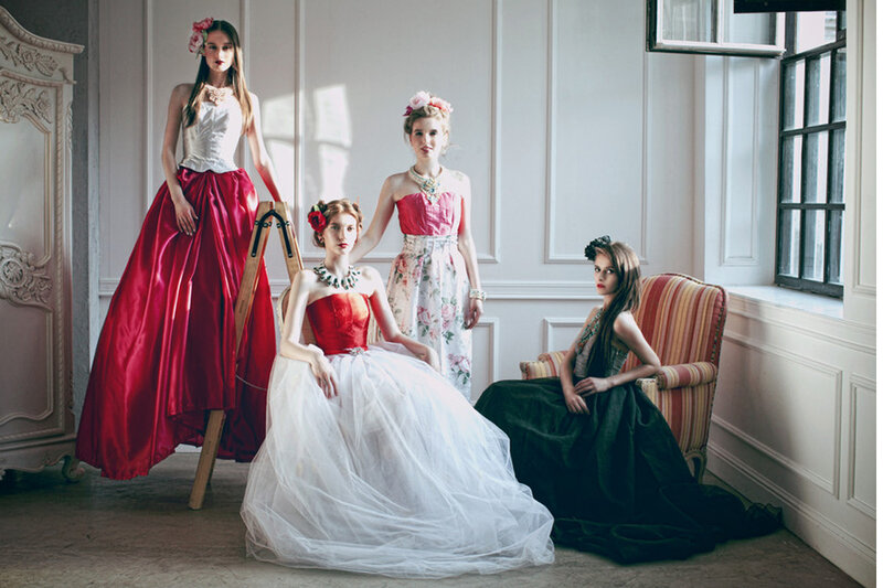 Four Women in Gowns
