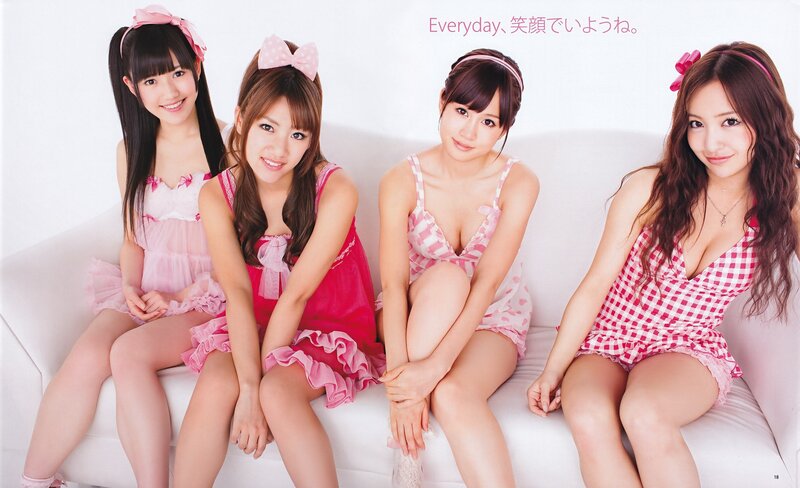Four women in pink outfits