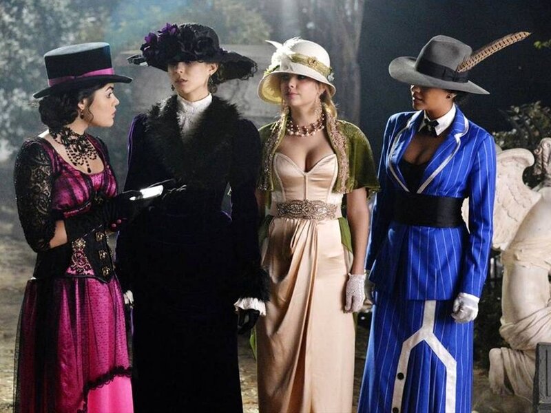Four Women in Vintage Outfits