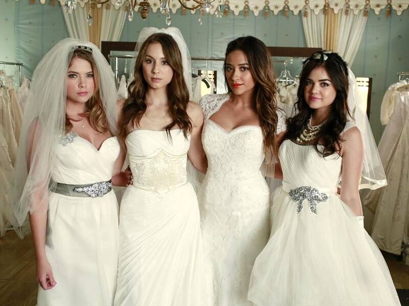 Four Women in Wedding Dresses