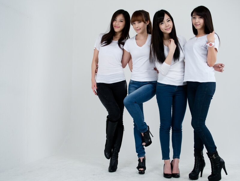 four women in white shirts