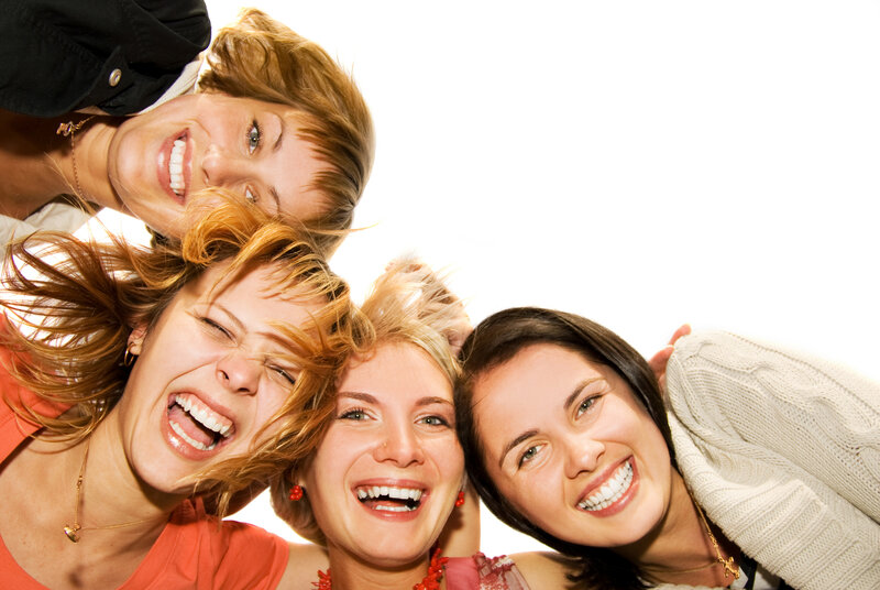 Four Women Laughing