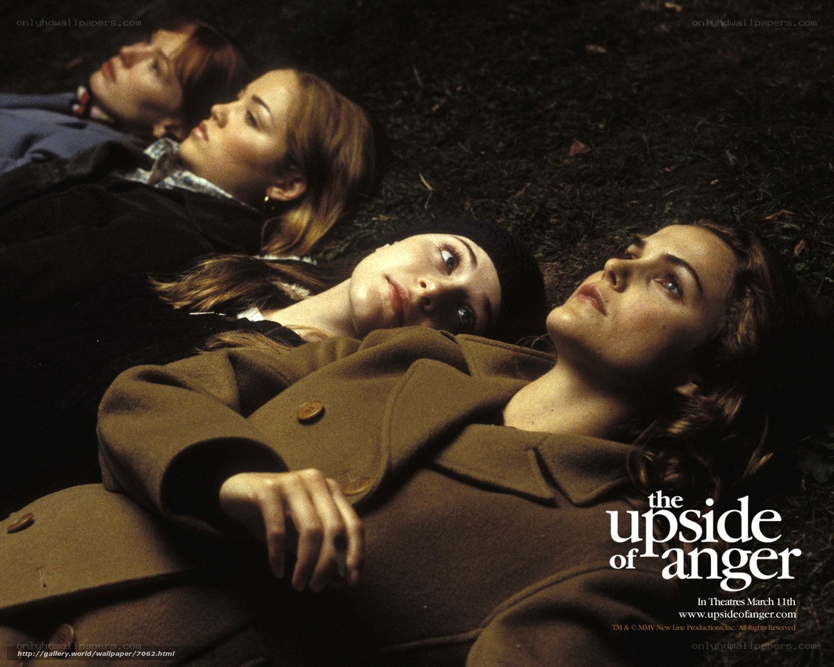 four women lying on ground