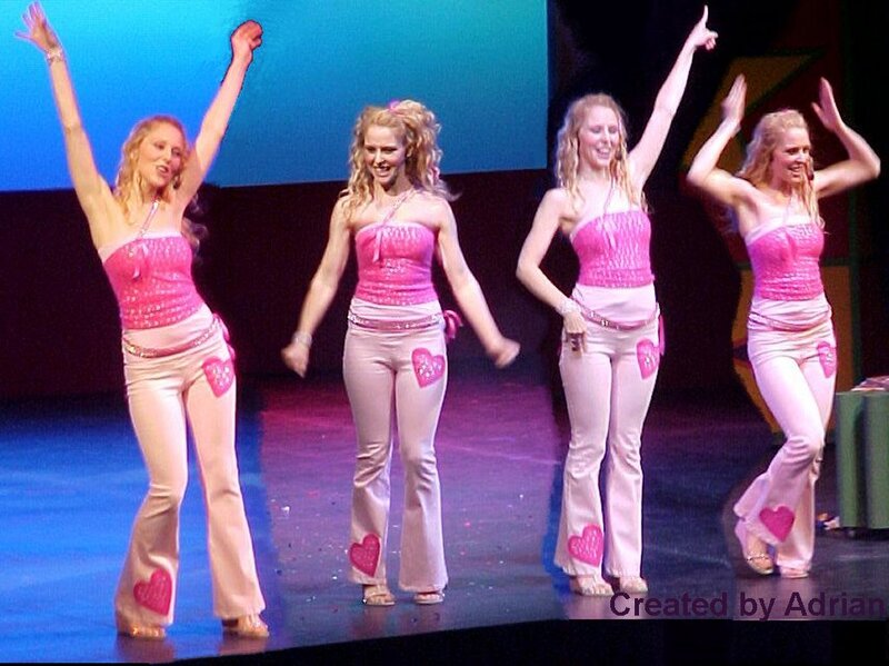 Four Women on Stage — Pink