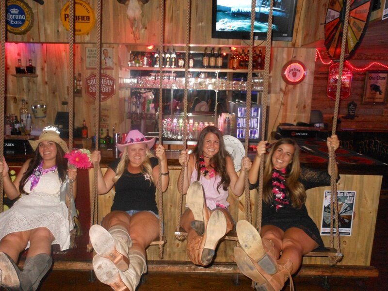Four Women on Swings