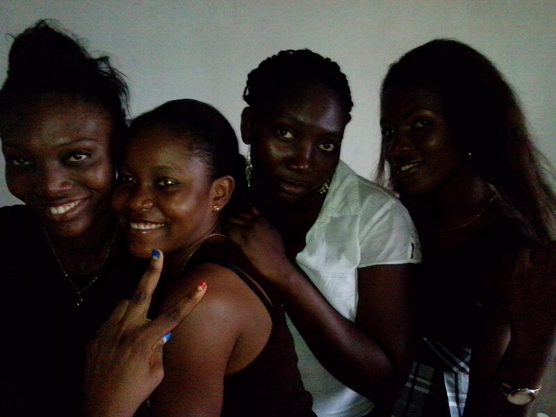 Four Women Posing Together — Black, Friendly