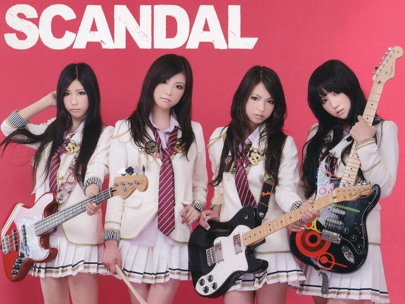 Four Women with Guitars