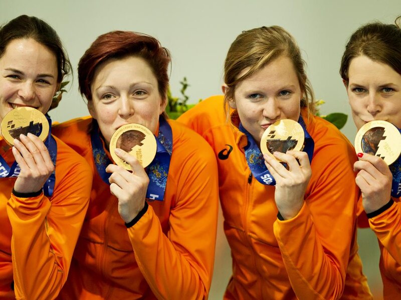Four Women with Medals