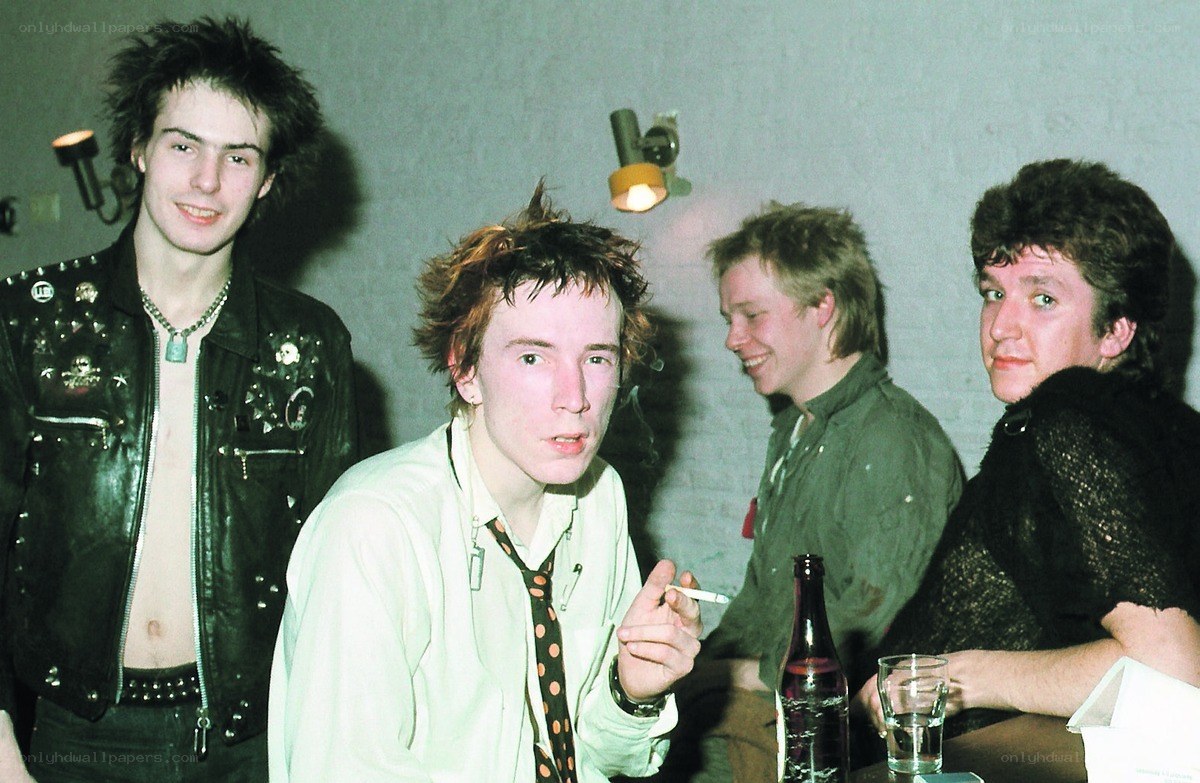 Four young men at a gathering