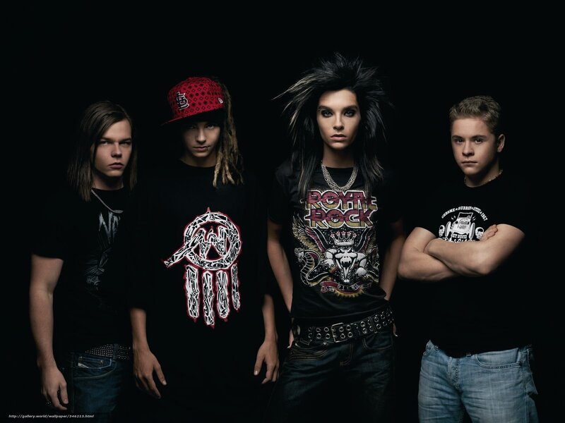 Four Young Men in Band Attire — Black